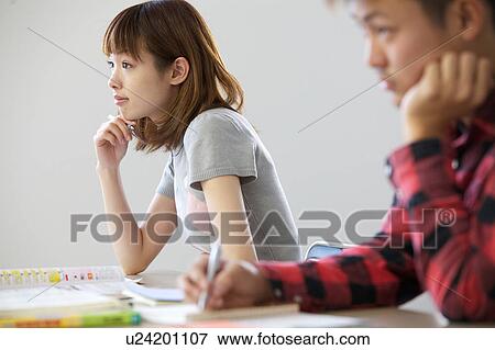 Young Woman Taking a Class View Large Photo Image Stock Photo - Young Woman Taking a Class. Fotosearch