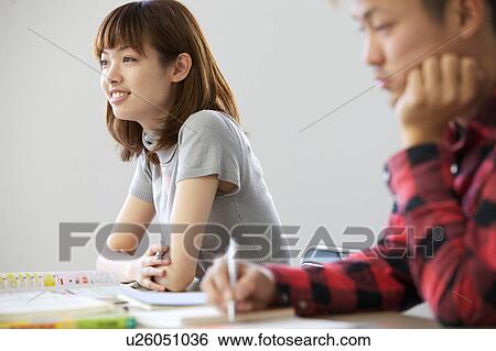 Young Woman Taking a Class View Large Photo Image Stock Photograph - Young Woman Taking a Class. Fotosearch