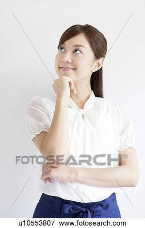 Stock Photo - Young Woman Thinking. Fotosearch