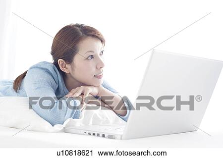 Young Woman Using Laptop View Large Photo Image Stock Image - Young Woman Using Laptop. Fotosearch