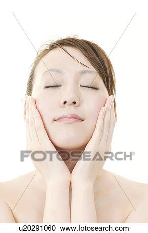 Young Woman with Eyes Closed Touching Her Face View Large Photo Image Stock Image - Young Woman with Eyes Closed Touching Her Face. Fotosearch