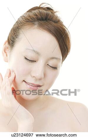 Young Woman with Eyes Closed Touching Her Face View Large Photo Image Stock Photo - Young Woman with Eyes Closed Touching Her Face. Fotosearch