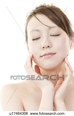 Young Woman with Eyes Closed Touching Her Face View Large Photo Image Stock Photograph - Young Woman with Eyes Closed Touching Her Face. Fotosearch