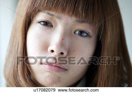 Stock Photo - Young Woman's Face. Fotosearch