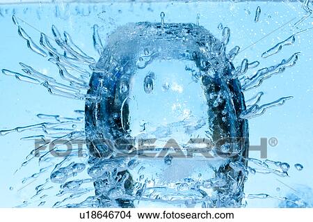 Picture - Air Bubbles in Frozen Water. Fotosearch