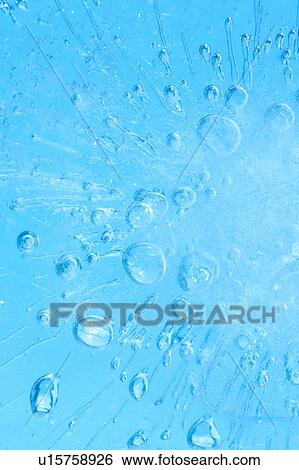 Stock Photograph - Air Bubbles in Frozen Water. Fotosearch