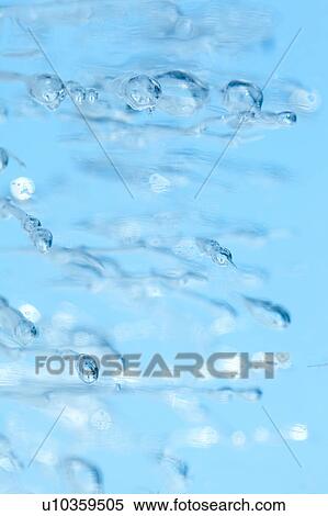 Stock Photography - Air Bubbles in Frozen Water. Fotosearch