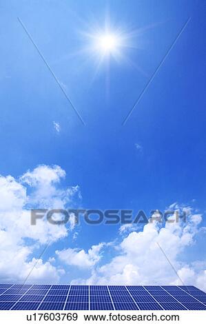 Blue Sky and Sun Over Solar Panels View Large Photo Image Stock Photo - Blue Sky and Sun Over Solar Panels. Fotosearch