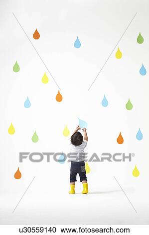 Boy Catching Raindrop View Large Photo Image Stock Image - Boy Catching Raindrop. Fotosearch