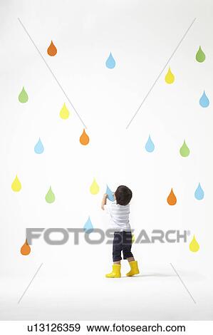 Boy Catching Raindrop View Large Photo Image Stock Photo - Boy Catching Raindrop. Fotosearch