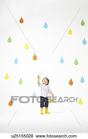 Boy Catching Raindrop View Large Photo Image Stock Photo - Boy Catching Raindrop. Fotosearch