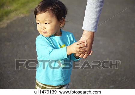 Boy Holding Grandmother's Hand View Large Photo Image Stock Photo - Boy Holding Grandmother's Hand. Fotosearch