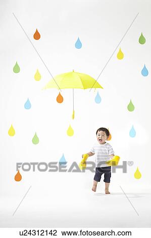 Boy in Colourful Rain View Large Photo Image Stock Image - Boy in Colourful Rain. Fotosearch