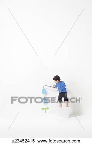 Boy Watering Plant View Large Photo Image Stock Photography - Boy Watering Plant. Fotosearch