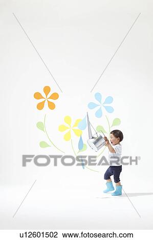 Stock Image - Boy Watering Plants. Fotosearch