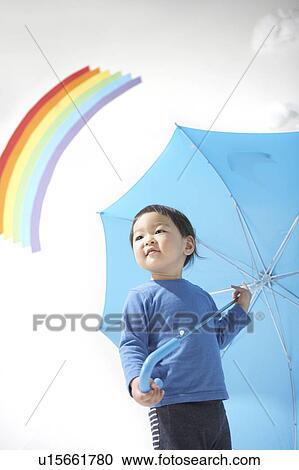 Boy with an umbrella View Large Photo Image Stock Image - Boy with an umbrella. Fotosearch