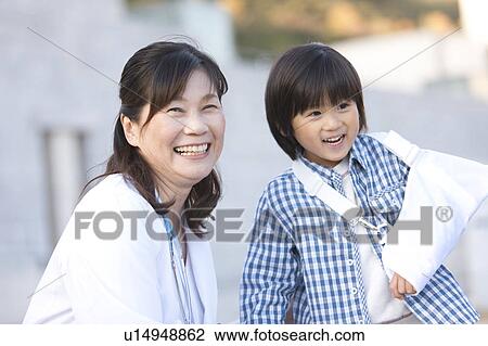 Boy with Broken Arm and Female Doctor View Large Photo Image Stock Image - Boy with Broken Arm and Female Doctor. Fotosearch
