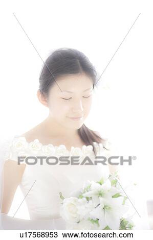 Bride holding a bouquet View Large Photo Image Stock Image - Bride holding a bouquet. Fotosearch
