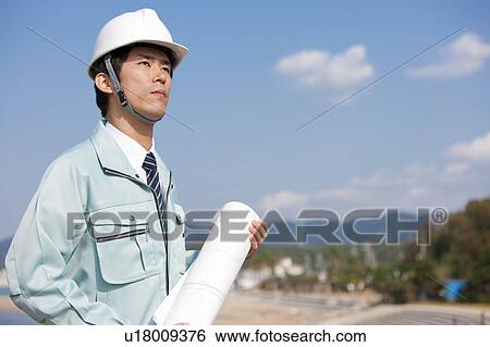 Stock Photograph - Businessman at Construction Site. Fotosearch