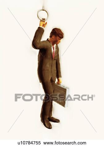 Businessman standing with briefcase holding a handle View Large Photo Image Stock Photography - Businessman standing with briefcase holding a handle. Fotosearch