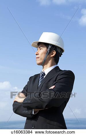 Businessman Wearing Hardhat View Large Photo Image Picture - Businessman Wearing Hardhat. Fotosearch