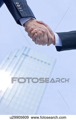 Businessmen shaking hands View Large Photo Image Stock Photo - Businessmen shaking hands. Fotosearch