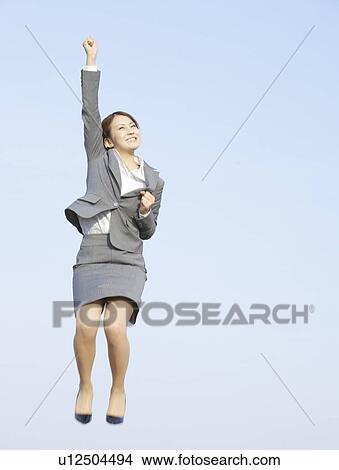 Businesswoman Jumping With Joy View Large Photo Image Picture - Businesswoman Jumping With Joy. Fotosearch