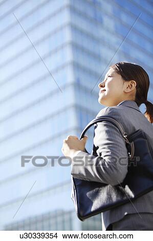 Picture - Businesswoman Looking Up. Fotosearch