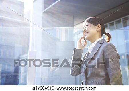 Businesswoman on Phone View Large Photo Image Stock Image - Businesswoman on Phone. Fotosearch