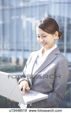 Businesswoman Using Laptop View Large Photo Image Stock Photo - Businesswoman Using Laptop. Fotosearch
