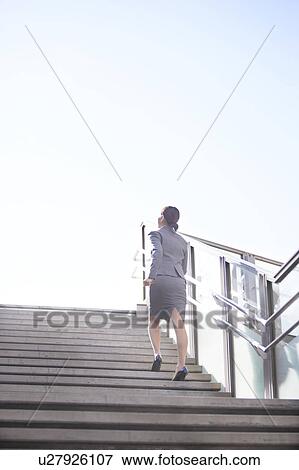 Businesswoman Walking Up Steps View Large Photo Image Stock Photo - Businesswoman Walking Up Steps. Fotosearch