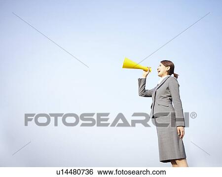 Stock Photograph - Businesswoman with Megaphone. Fotosearch
