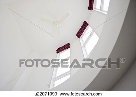 Stock Photo - Ceiling fan and windows. Fotosearch