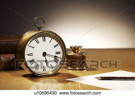 Clock, fountain pen, paper and books View Large Photo Image Stock Image - Clock, fountain pen, paper and books. Fotosearch