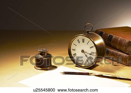 Clock, fountain pen, paper and books View Large Photo Image Stock Image - Clock, fountain pen, paper and books. Fotosearch