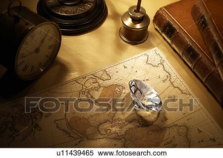 Stock Photography - Crystal on antique map. Fotosearch