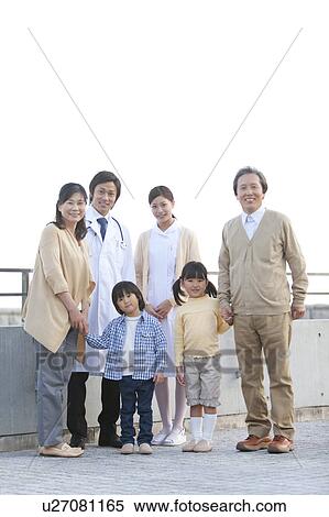 Stock Photography - Doctor with Family. Fotosearch