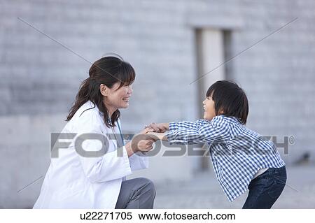 Female Doctor and Boy View Large Photo Image Stock Photography - Female Doctor and Boy. Fotosearch