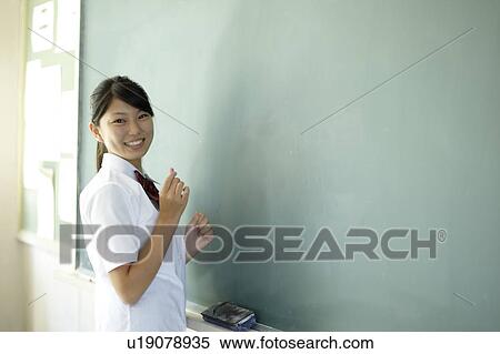 Female Student by Blackboard View Large Photo Image Stock Photography - Female Student by Blackboard. Fotosearch