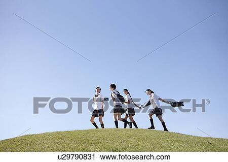 Four Schoolgirl on Hill View Large Photo Image Stock Image - Four Schoolgirl on Hill. Fotosearch