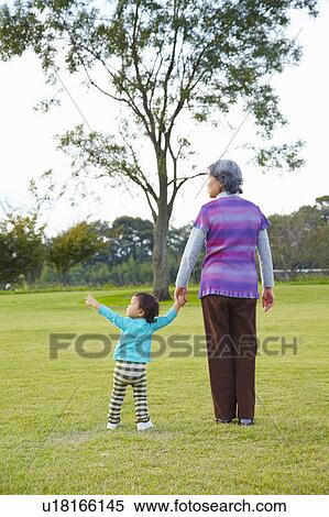 Stock Photography - Grandmother and Grandson in Park. Fotosearch