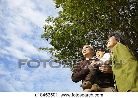 Stock Image - Grandparents and Grandson. Fotosearch