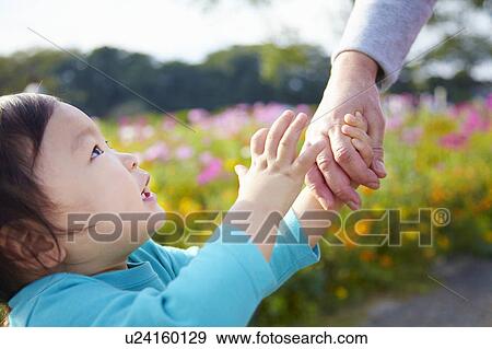 Grandson Looking Up at Grandmother View Large Photo Image Stock Photo - Grandson Looking Up at Grandmother. Fotosearch