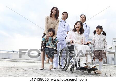 Stock Photography - Hospital Staff and Patient's Family. Fotosearch