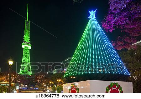 Stock Photo - Illuminated TV Tower and Central Park, Nagoya, Japan. Fotosearch