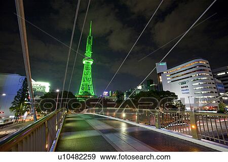 Illuminated TV Tower and Footbridge at the Central Park in Nagoya, Japan View Large Photo Image Stock Photo - Illuminated TV Tower and Footbridge at the Central Park in Nagoya, Japan. Fotosearch
