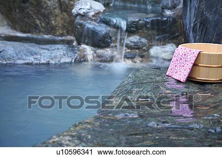 Stock Image - Japanese-style hot spring. Fotosearch
