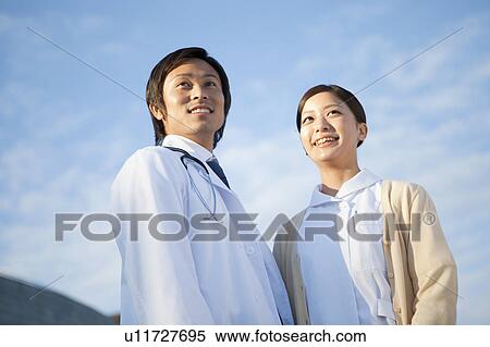 Male Doctor and Femlae Nurse View Large Photo Image Stock Photography - Male Doctor and Femlae Nurse. Fotosearch