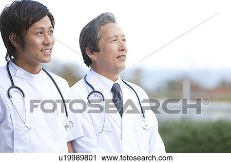 Male Nurse and Doctor View Large Photo Image Stock Image - Male Nurse and Doctor. Fotosearch