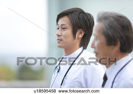 Male Nurse and Doctor View Large Photo Image Stock Photo - Male Nurse and Doctor. Fotosearch